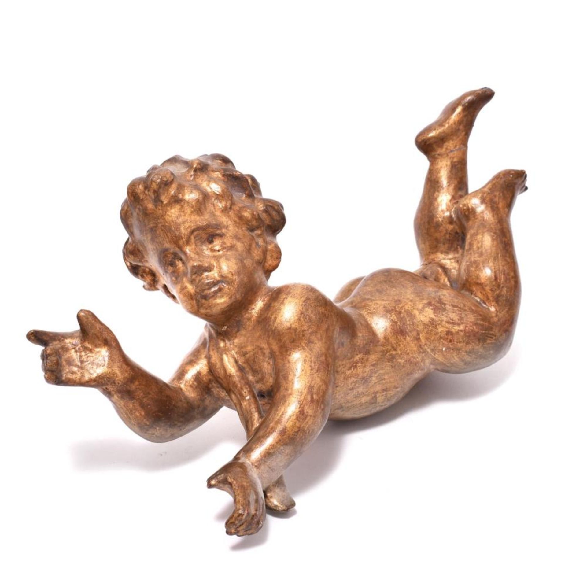 Putto. Holz, geschnitzt, Goldfassung.