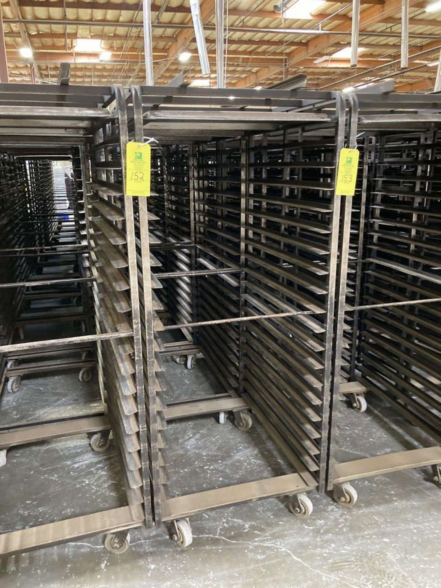 LOT of 13 baking pan rack with caster, 26 in w x 36 in deep x 20 slots. ***RIGGING FEE of $130