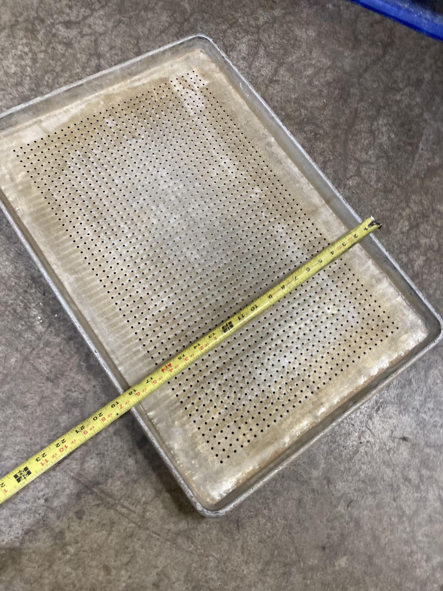 (LOT of approx 100) perforated hole sheet baking pan, 26 in x 18.5 in. ***RIGGING FEE of $75