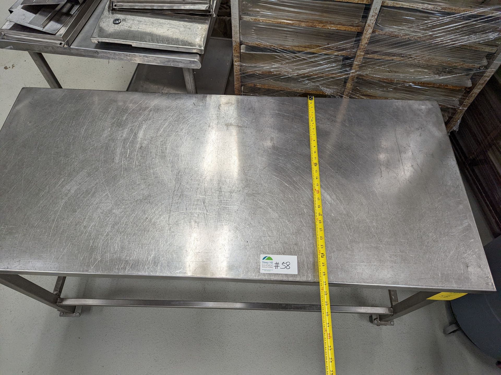 Stainless Table on castor wheels, 60Lx27Wx34H - Image 2 of 4