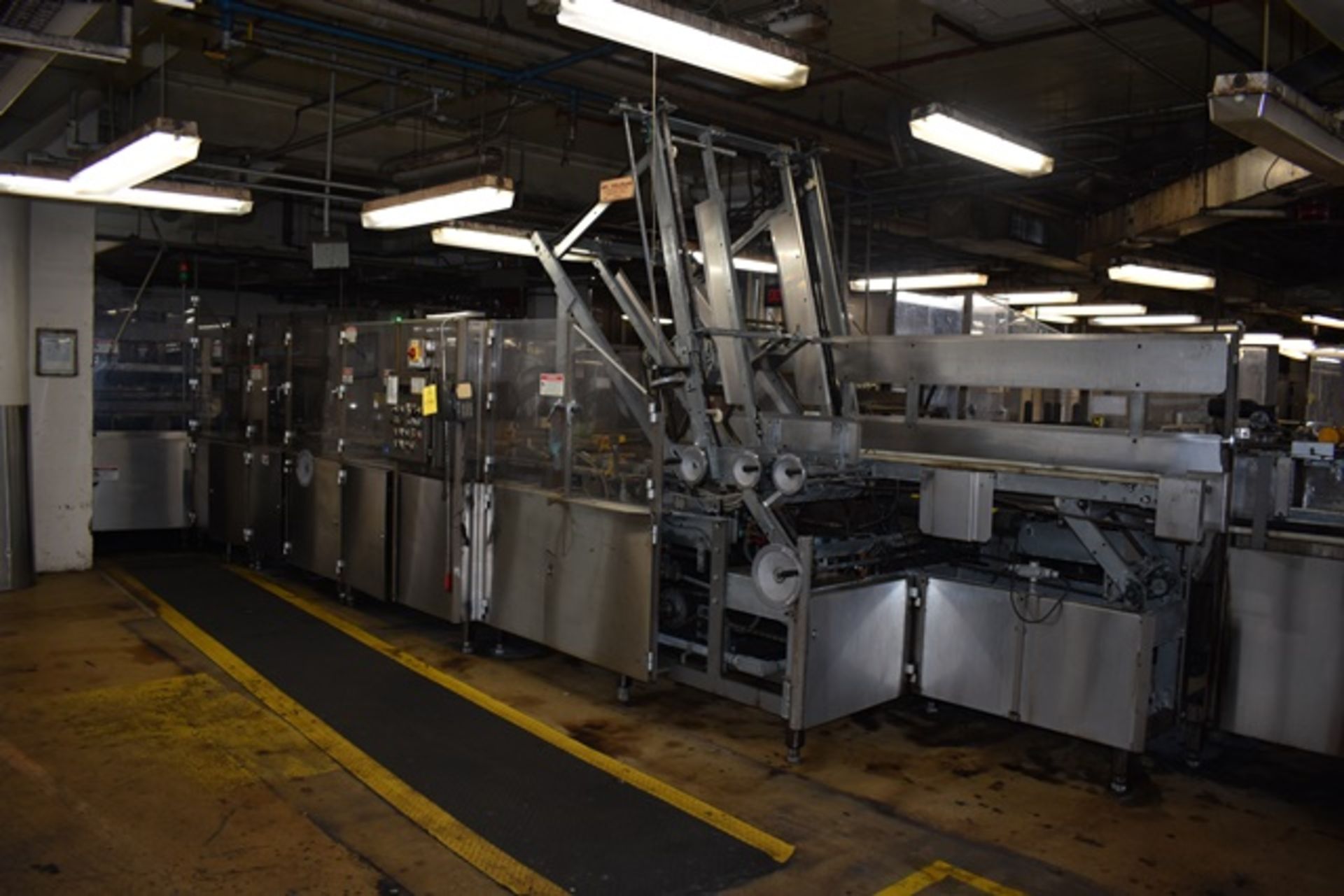 Douglas/APV tray packer, model CMWACP-24, s/n M-2359RB / M104052, side load, with 28'L, 4 lanes