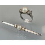 Schmuckset aus Ring und Brosche. Circa 15,4 Gramm Gesamtgewicht.