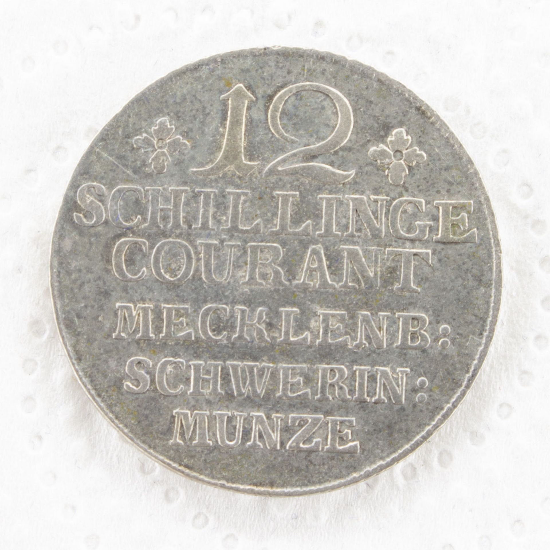 12 Schilling