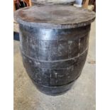 A Vintage metal bound Barrell with timber top used as a table. D 49 x H 65 cm approx.