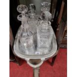 A good quantity of Crystal Decanters along with a silver plated tray.