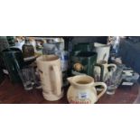 A selection of Whiskey Jugs to include Jameson, Tullamore Dew, Kilbeggan, and a Ritz Jug , a