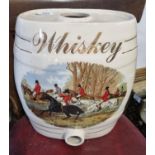 A Vintage Delph Whiskey container with a hunting scene to the front. H 30 x D 14 x W 23 cm approx.