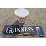 A "Guinness Is Good For You " Bucket along with a Guinness Mat.