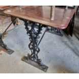 A Cast Iron pub Table with timber top and rectangular form. 104 x 60 H72 cm approx.
