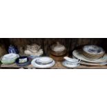 A good quantity of Delph and pottery wares to include Platters etc on one shelf.