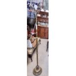 A late 19th early 20th Century Brass rise and fall standard Lamp. H 175 cm approx.