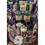 A collection of Black & White Scotch Whiskey to include two large Bottles, Jugs, Glasses, a Hip