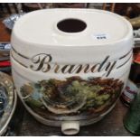 A Delph Brandy Jar with a country scene on the front.