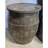 A good Metal bound Barrel used as a table. D 49 x H 65 cm approx.