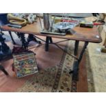 A rectangular Cast Iron Pub Table with a timber top.