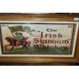 A framed Pub Advertising Print 'The Irish standard Whiskey'.