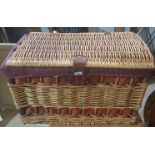 A Picnic Basket along with number of Wicker Baskets and a Kitchen Vegetable Stand with chopping