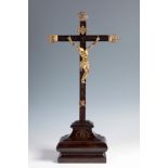 Italian school, 18th century.Christ.Figure in gilded bronze.Wooden cross with bronze applications.