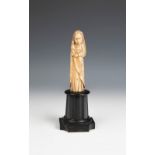 Indo-Portuguese school, ca.1600."Virgin and Child.Carved ivory.Rear pedestal.Measurements: 12 cm