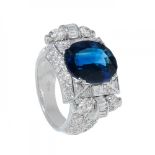 Ring in 18k white gold with a 10.24 ct. blue Pailin sapphire.The chevalier setting features a