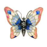 Brooch pin with butterfly motif with polychrome enamel.Brilliant with an estimated weight of 0.34