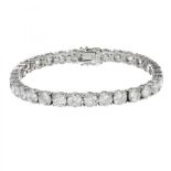 Riviere bracelet in 18kts white gold. Classic articulated model with brilliant-cut diamonds,