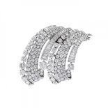 18 kt white gold brooch. With six lines of diamonds, brilliant, antique, rock and baguette cuts, J-K