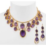 Amethyst setting in 18k yellow gold. France S XIX.Hook clasp earrings.Gold cord necklace in two