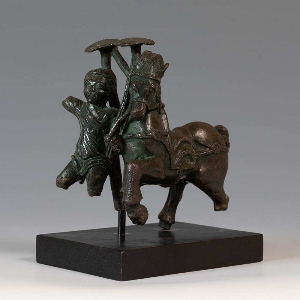 Applique for chariot with horse and rider; Rome, 2nd-3rd century AD.Bronze.Attached