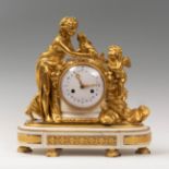 Louis XVI table clock. France, ca. 1770.Mercury-gilt bronze and marble. Hand-painted enamelled