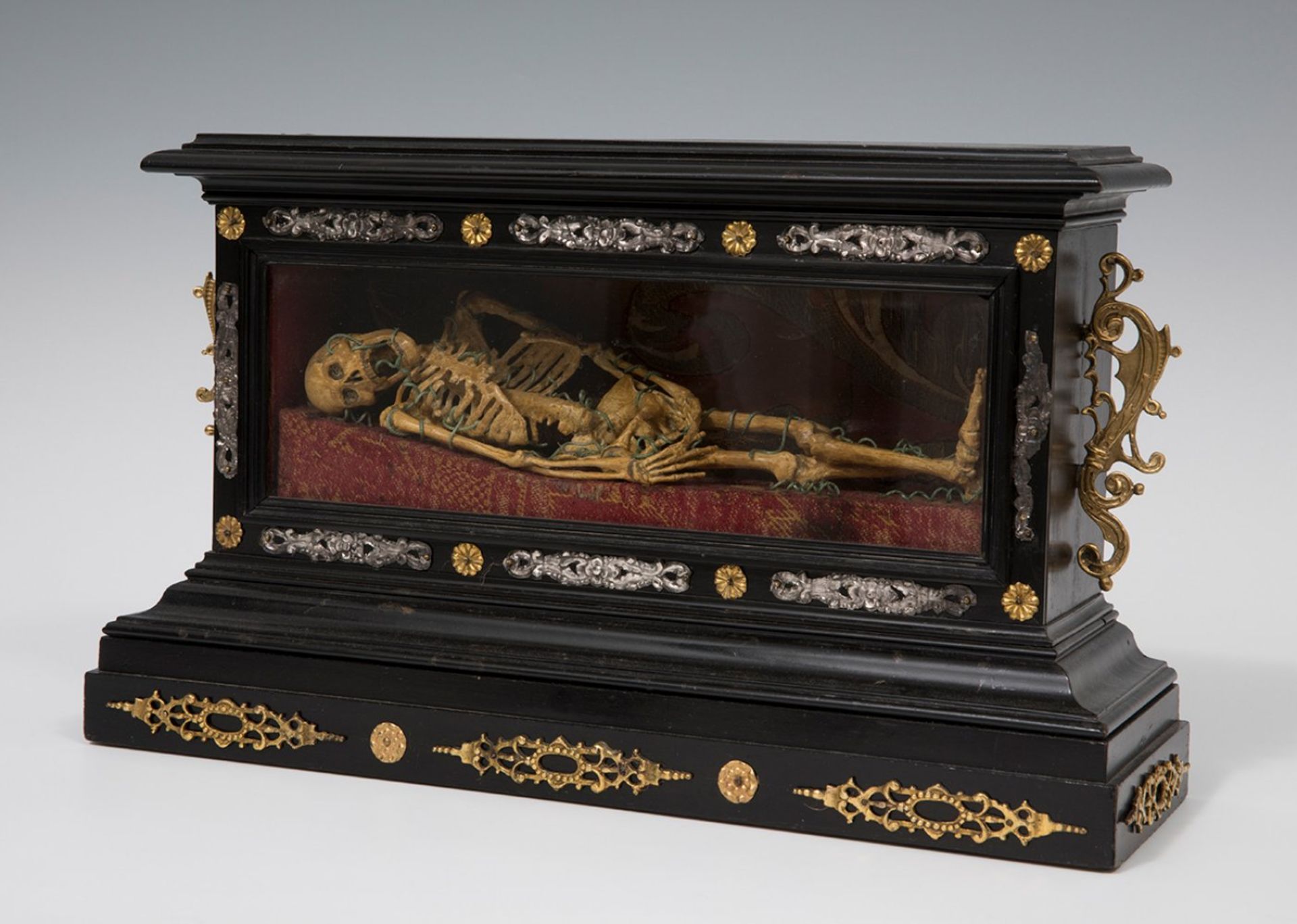 Italian school, 17th century."Vanitas".Carved and polychrome wood. Brass, bronze and silver.