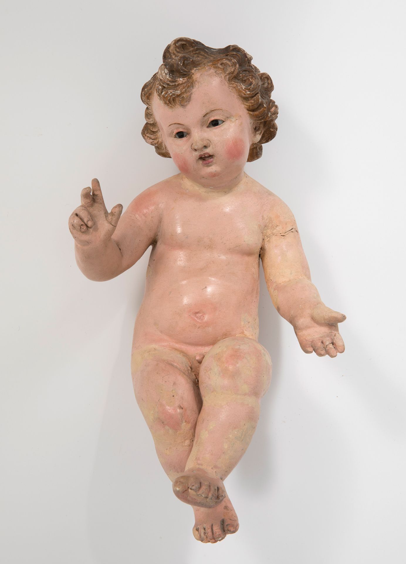 Italian school; possibly Naples, 18th century."Infant Jesus".Polychrome terracotta and vitreous