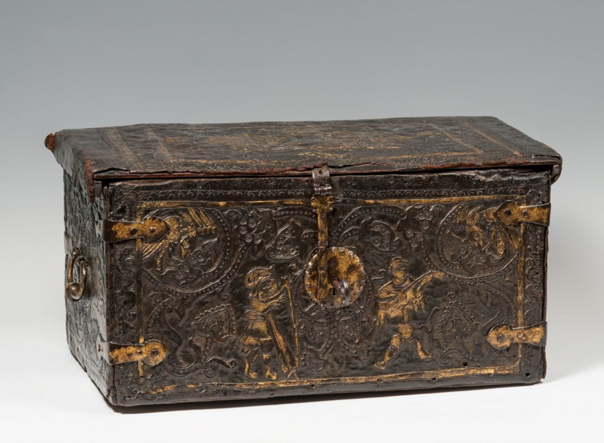Colonial chest from the 17th century.Embossed and gilded leather, wood and wrought iron.