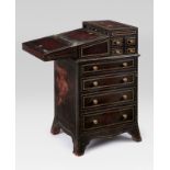 MAITLAND-SMITH desk, 1940s-50s.Wood covered in embossed leather and bronze handles.Signature