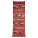 Turkish kilim, first half of the 19th century.Hand-knotted wool.Measurements: 110 x 340 cm.This