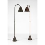 Pair of floor lamps from the 1940s.Metal covered in leather.Bulbs still intact.Measurements: 157,5 x