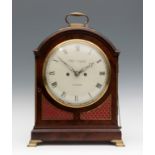 Regency clock, signed CHARL DUPLOCK. London, 1790 - 1819.Mahogany veneered case with bronze