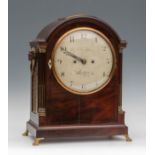 Regency clock, signed J H. WICKES. London, 1798-1810.Mahogany veneered case with bronze appliques.