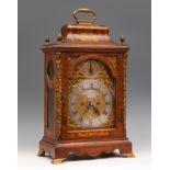 George II bracket clock, signed JAMES SMITH. London, mid 18th century.Red lacquered case with gilt