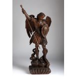 Spanish School of the 16th century."Saint George".Carved walnut wood.Restoration on one wing.