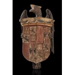 Coat of arms of the Catholic Monarchs. Spain, ca.1500.Carved and polychrome wood.Measurements: 57