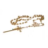 Rosary in 18kt yellow gold. Frontis in the form of an openwork cartouche from which hangs the