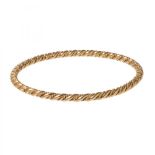 Bracelet in 18kt yellow gold. Model of torsos threads, braided.Measurements: 65,7 mm (inner