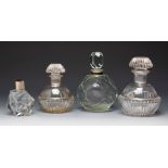 Four Art Deco perfume bottles. France ca. 1940. Moulded glass.Provenance: Spanish private