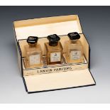Set of three miniatures, LANVIN perfumes. France, 1960s.Glass bottles. Lithographed cardboard.