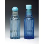 RENÉ LALIQUE (Ay, France, 1860- Paris, 1945).Two Worth "Je reviens" bottles, ca. 1940.Blue moulded