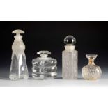 Four fragrance bottles. France, 1940s-50s.Moulded and satin-finished glass.No contents.Provenance: