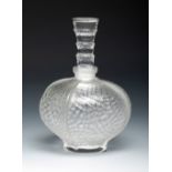 MARC LALIQUE (Paris, France, 1900 - 1977).Perfumer, ca. 1980.Moulded glass.Signed on the reverse