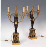 Pair of candlesticks, Empire period, c.1810.Gilt and blued bronze.Electrified.Measurements: 62,5 x