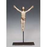 Indo-Portuguese school; 17th century."Crucified Christ".Carved and polychrome ivory.CITES